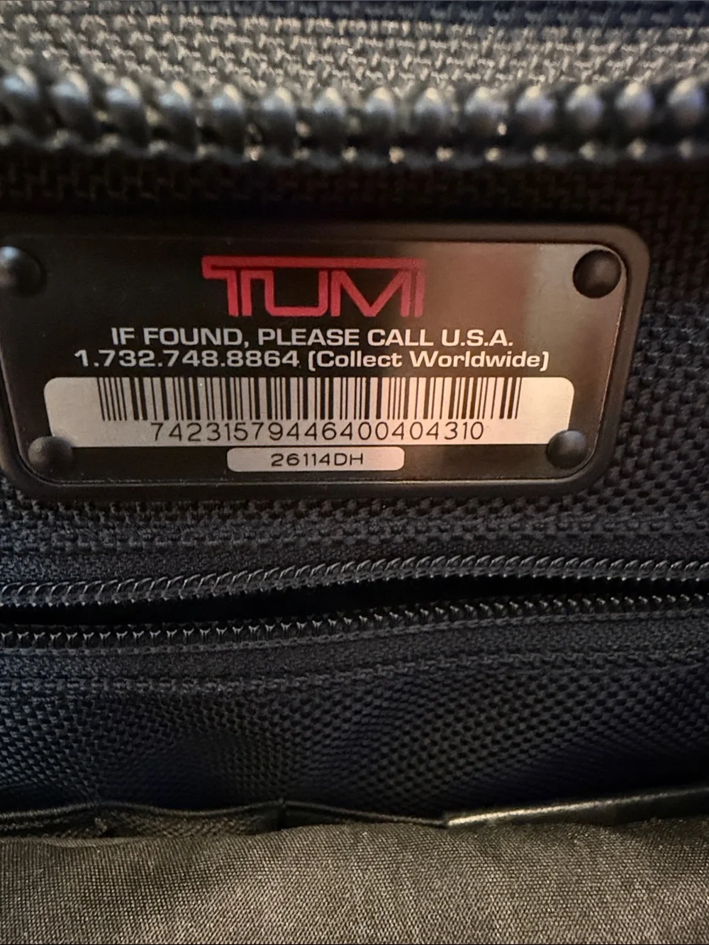Tumi Black Nylon Briefcase with Dual Front Pockets and Leather Tag